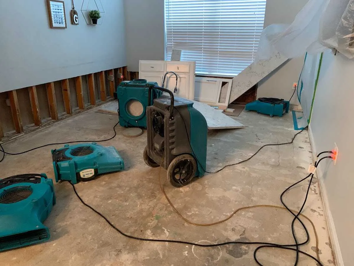 Dehumidifier in flood-cut room for Water Damage Restoration in Baldwin