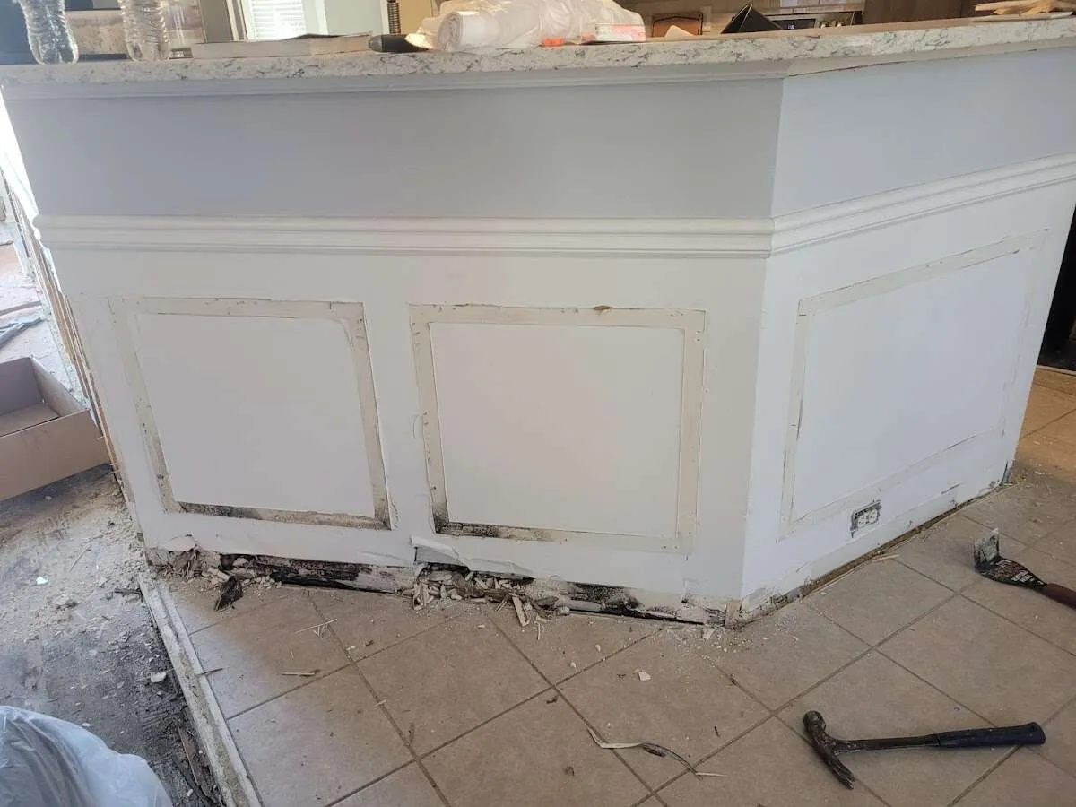 Water damage and mold on kitchen during Storm Damage Restoration in Baldwin